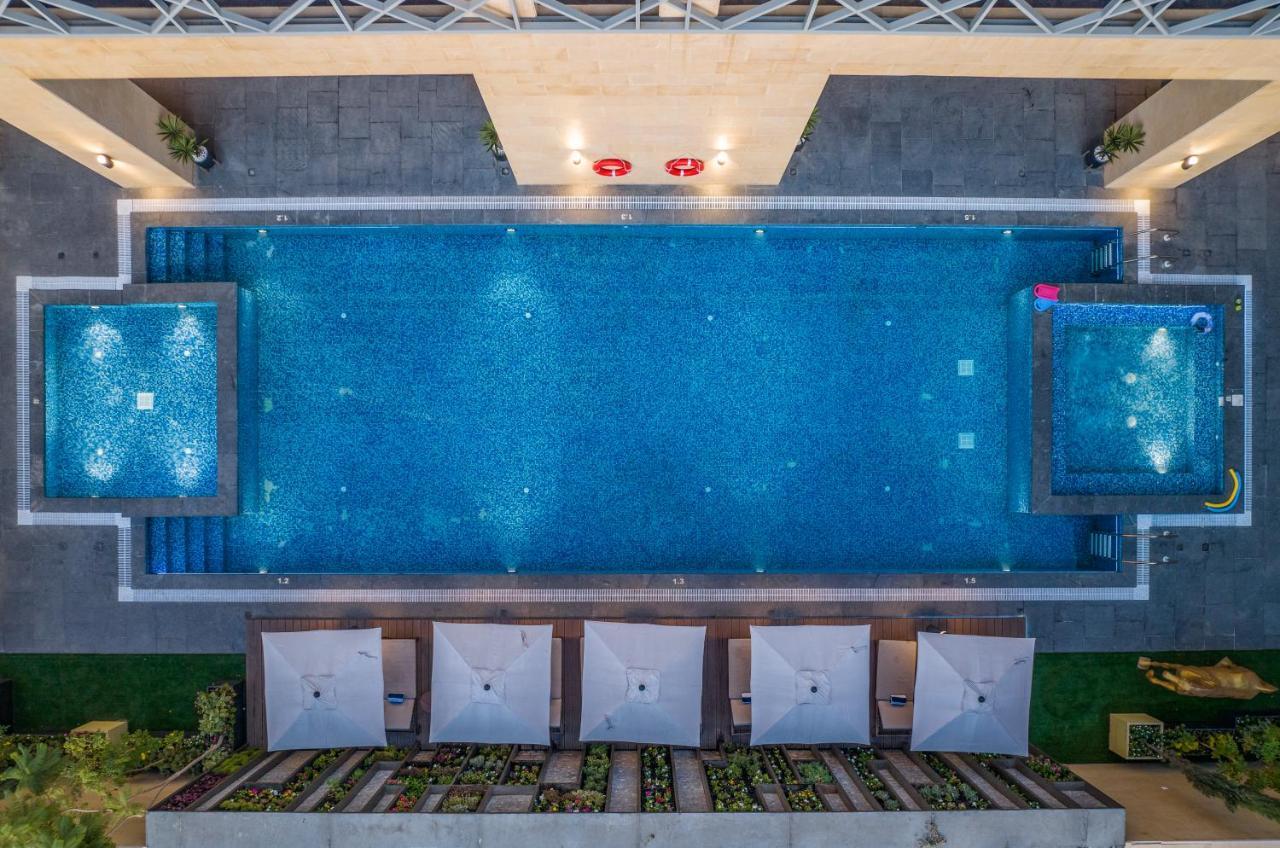 אפרטהוטל Citadines אבהא מראה חיצוני תמונה The swimming pool at the hotel