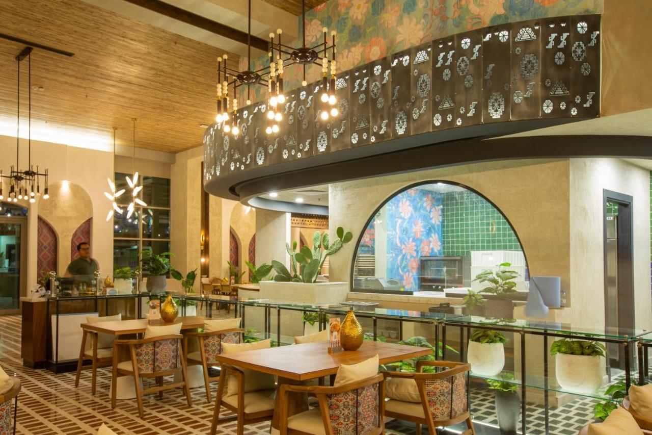 אפרטהוטל Citadines אבהא מראה חיצוני תמונה The interior of the restaurant